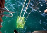 subsea equipment being lowerd through moon pool